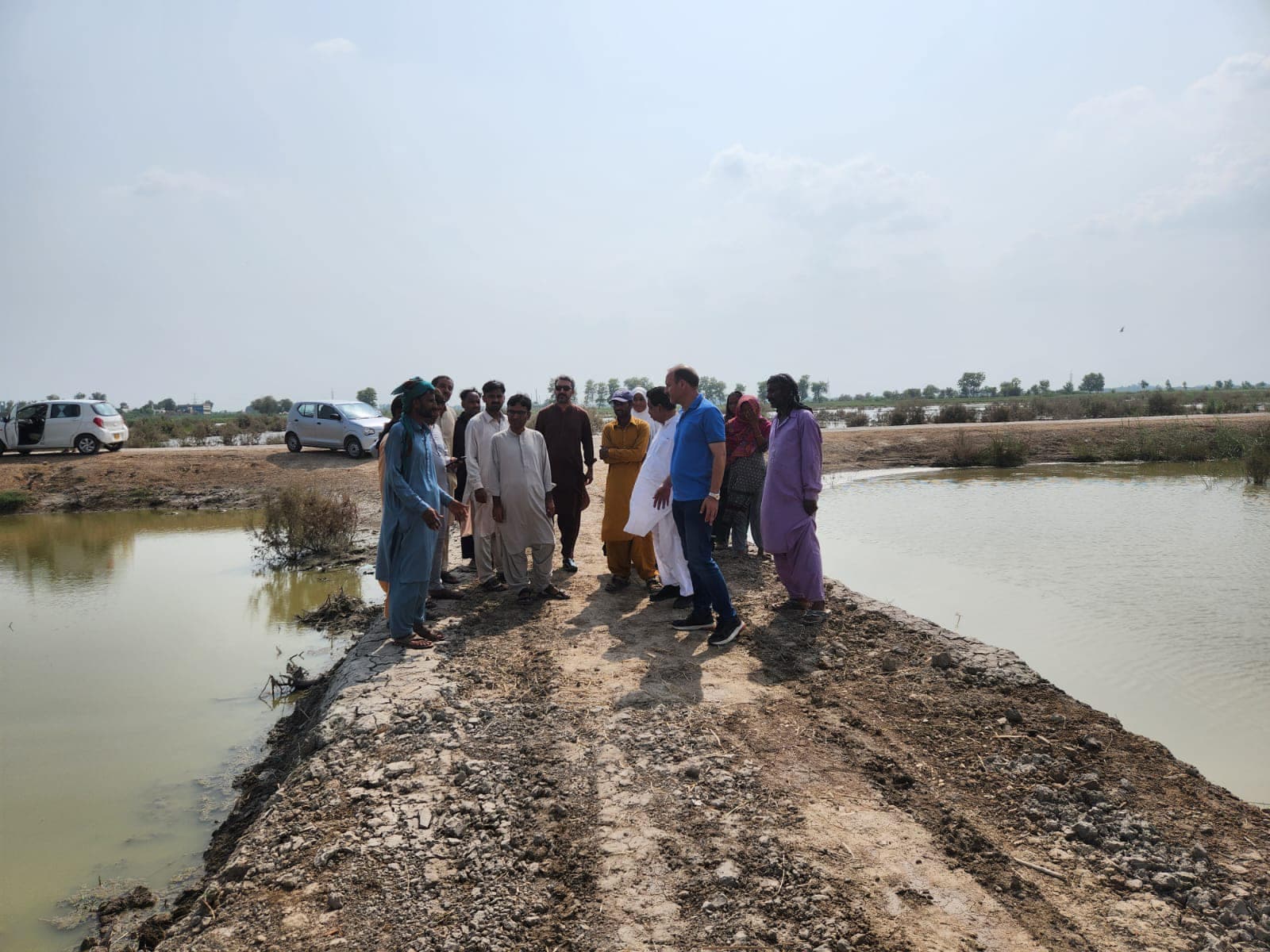 A road repair visit in a flood-hit area of Sindh